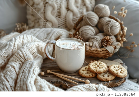 A Cozy Winter Afternoon With a Cup of Coffee and Knitting Supplies 115398564