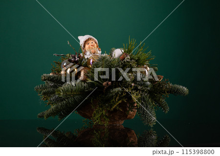 Christmas Arrangement With Santa Figurine Christmas Arrangement With Santa Figurine 115398800