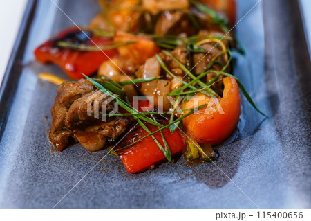 Stewed meat with vegetables and mushrooms 115400656