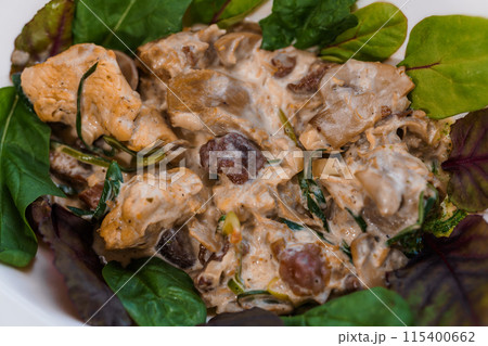 Stewed meat with vegetables and mushrooms 115400662