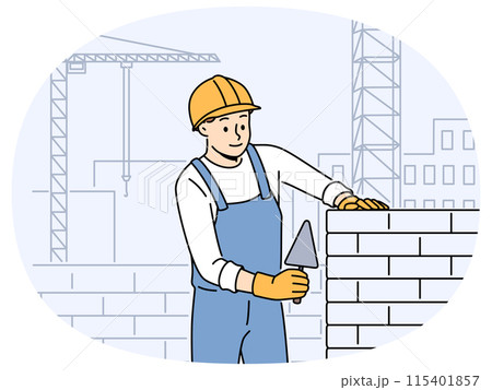 Male worker in uniform laying bricks 115401857