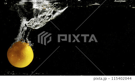 Fresh fruit falling into the water. Organic fruits for making effective juices for dieting. Fresh fruit falling into the water. Organic fruits for making effective juices for dieting. 115402044