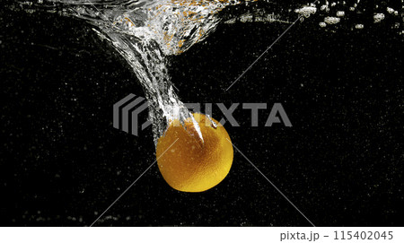Fresh fruit falling into the water. Organic fruits for making effective juices for dieting. Fresh fruit falling into the water. Organic fruits for making effective juices for dieting. 115402045