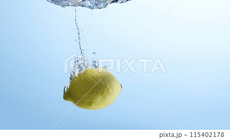 Fresh fruit falling into the water. Organic fruits for making effective juices for dieting. Fresh fruit falling into the water. Organic fruits for making effective juices for dieting. 115402178