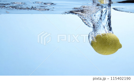 Fresh fruit falling into the water. Organic fruits for making effective juices for dieting. Fresh fruit falling into the water. Organic fruits for making effective juices for dieting. 115402190