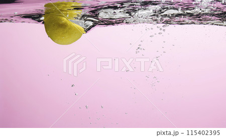 Fresh fruit falling into the water. Organic fruits for making effective juices for dieting. Fresh fruit falling into the water. Organic fruits for making effective juices for dieting. 115402395