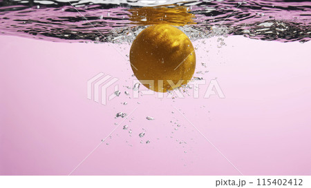 Fresh fruit falling into the water. Organic fruits for making effective juices for dieting. 115402412