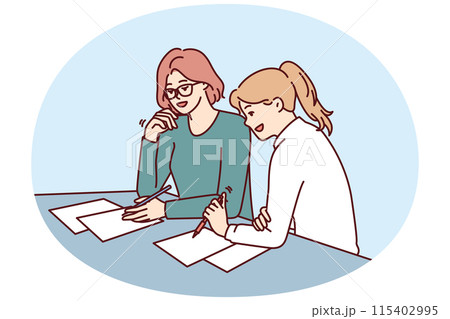 Women doing paperwork sitting at table in office of insurance company during conclusion of contract 115402995