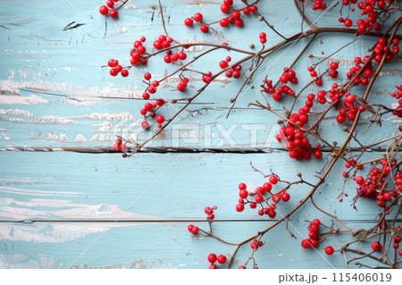 Red rowan berries on a blue rustic wooden background 115406019