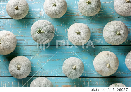 Melons on a blue rustic wooden background 115406027