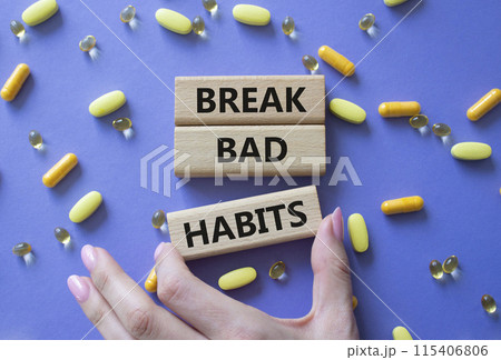 Break bad habits symbol. Concept words Break bad habits on wooden blocks. Beautiful purple background with pills. Doctor hand. Medicine and Break bad habits concept. Copy space. Break bad habits symbol. Concept words Break bad habits on wooden blocks. Beautiful purple background with pills. Doctor hand. Medicine and Break bad habits concept. Copy space. 115406806
