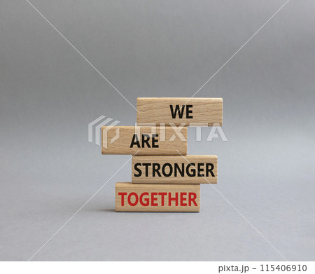 We are stronger together symbol. Wooden blocks with words We are stronger together. Beautiful grey background. We are stronger together concept. Copy space. We are stronger together symbol. Wooden blocks with words We are stronger together. Beautiful grey background. We are stronger together concept. Copy space. 115406910