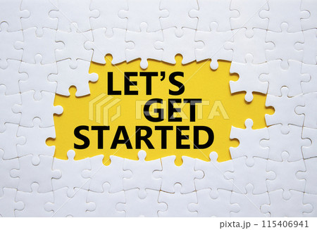Lets get started symbol. Concept words Lets get started on white puzzle. Beautiful yellow background. Business and Lets get started concept. Copy space. 115406941