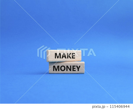 Make Money symbol. Wooden blocks with words Make Money. Beautiful blue background. Business and Make Money concept. Copy space. 115406944