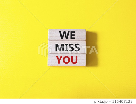 We Miss you symbol. Concept words We Miss you on wooden blocks. Beautiful yellow background. Emotion and We Miss you concept. Copy space. We Miss you symbol. Concept words We Miss you on wooden blocks. Beautiful yellow background. Emotion and We Miss you concept. Copy space. 115407125
