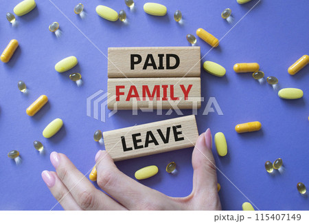 Paid Family Leave symbol. Concept words Paid Family Leave on wooden blocks. Beautiful purple background with pills. Doctor hand. Healthcare and Paid Family Leave concept. Copy space. Paid Family Leave symbol. Concept words Paid Family Leave on wooden blocks. Beautiful purple background with pills. Doctor hand. Healthcare and Paid Family Leave concept. Copy space. 115407149