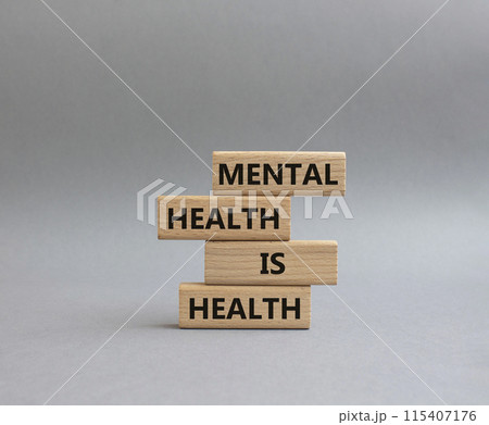 Mental Health symbol. Wooden blocks with words Mental Health is Health. Beautiful yellow background. Medical and Health concept. Copy space. 115407176