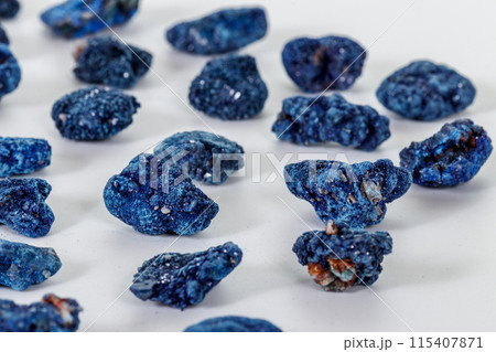 Macro mineral stone Malachite and Azurite against white background 115407871