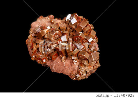 Macro mineral stone Vanadinite on a black background Macro mineral stone Vanadinite on a black background 115407928