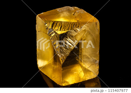 Macro stone mineral Ulexite on a black background 115407977