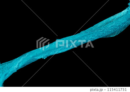 Blue Lace fabric flying in curve shape, Piece of textile Blue Lace fabric throw fall in air. Black background isolated motion blur Blue Lace fabric flying in curve shape, Piece of textile Blue Lace fabric throw fall in air. Black background isolated motion blur 115411731