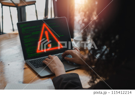 Data breach concept, Businesswoman using laptop computer on desk with system hacked warning alert icon on virtual screen, Cyber security and cybercrime, Virus, Spyware, Malware or Malicious software. Data breach concept, Businesswoman using laptop computer on desk with system hacked warning alert icon on virtual screen, Cyber security and cybercrime, Virus, Spyware, Malware or Malicious software. 115412214
