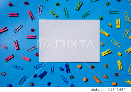 Frame border made of school stationery supplies and alarm clock. Copy space for your text or Educational greeting announcement for students and teacher. Creative vivid colorful background. Concept of Frame border made of school stationery supplies and alarm clock. Copy space for your text or Educational greeting announcement for students and teacher. Creative vivid colorful background. Concept of 115414444