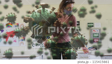 Caucasian woman wearing a mask interacts with a hologram Caucasian woman wearing a mask interacts with a hologram 115415661