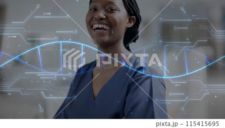 Image of dna strand and data processing over african american female doctor in hospital 115415695