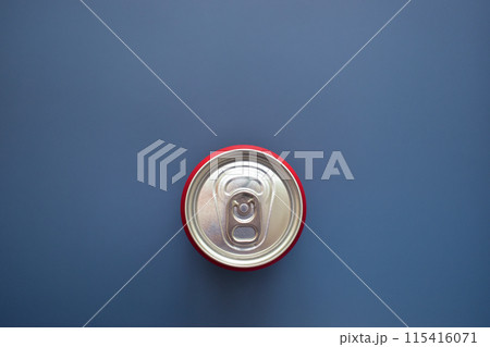 aluminium red cans soft drink put on blue texture background aluminium red cans soft drink put on blue texture background 115416071