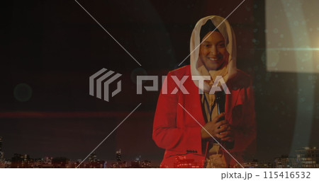 Image of asian woman in hijab with microphone, over cityscape 115416532