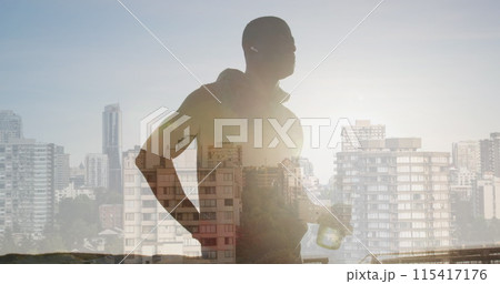 Image of glowing lights over an exercising african american man drinking water 115417176