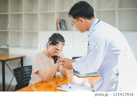 doctor hand holding the patient's hand. To encourage and comfort the patient so that the patient is not sad and worried. 115417919