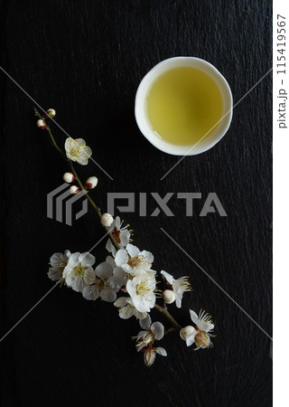 Traditional Japanese tea and apricot flowers. 115419567