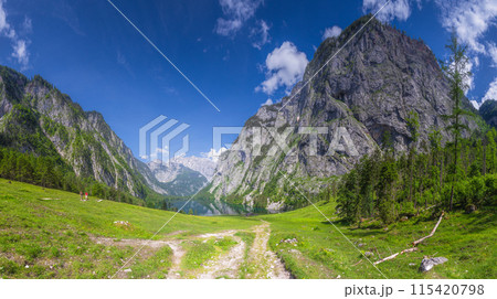 Mountain valley with tracks near Obersee lake in Berchtesgaden National Park Mountain valley with tracks near Obersee lake in Berchtesgaden National Park 115420798