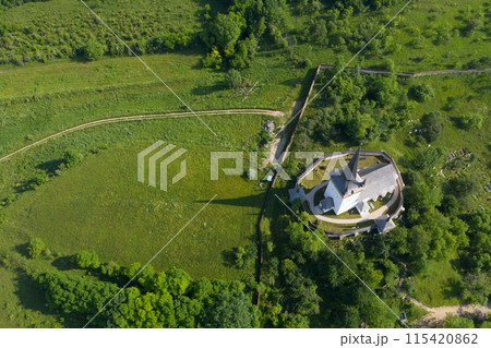 Aerial drone view of Valeni reformed church, Transylvania, Romania Aerial drone view of Valeni reformed church, Transylvania, Romania 115420862