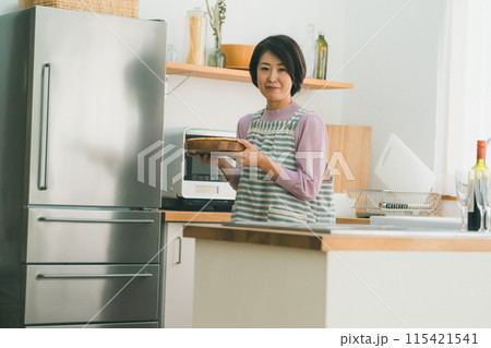 a forty-something woman a forty-something woman 115421541