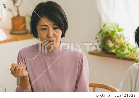 a forty-something woman a forty-something woman 115421628