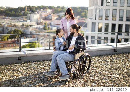 Mother and daughter support dad in treatment of serious injury. Mother and daughter support dad in treatment of serious injury. 115422939