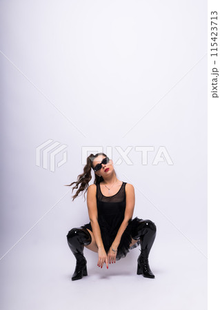 Fashion portrait of beautiful model in dress with sunglasses 115423713