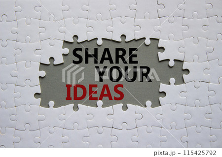 Share your Ideas symbol. Concept words Share your Ideas on white puzzle. Beautiful grey background. Business and Share your Ideas concept. Copy space. 115425792