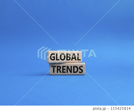 Global Trends symbol. Wooden blocks with words Global Trends. Beautiful blue background. Business and Global Trends concept. Copy space. Global Trends symbol. Wooden blocks with words Global Trends. Beautiful blue background. Business and Global Trends concept. Copy space. 115425814