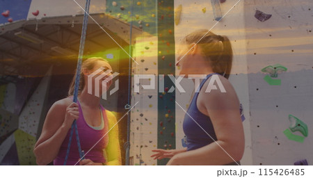Image of landscape over caucasian women by climbing wall Image of landscape over caucasian women by climbing wall 115426485