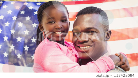 Image of male soldier embarcing his daughter over american flag Image of male soldier embarcing his daughter over american flag 115428094