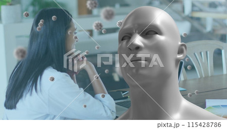 Image of human bust and covid 19 cells over businesswoman on laptop image call Image of human bust and covid 19 cells over businesswoman on laptop image call 115428786