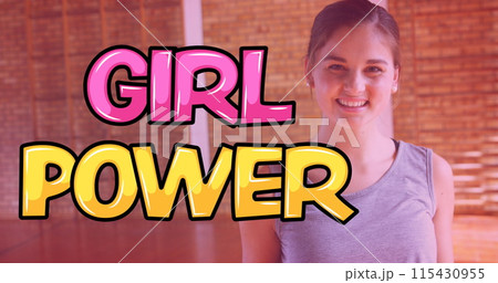 Image of girl power text over smiling girl with basketball ball 115430955