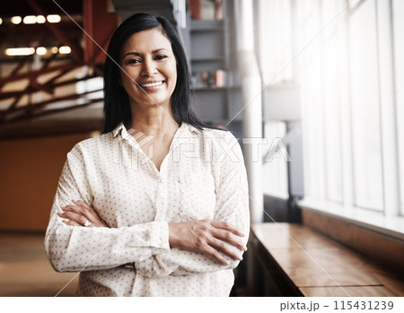 Happy, crossed arms and portrait of business woman in office with confidence for creative career. Smile, pride and professional female designer with positive attitude for startup company in Colombia. 115431239