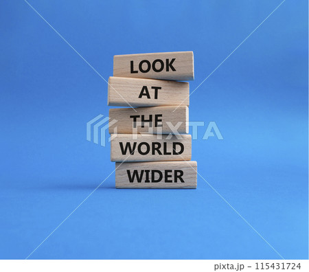 Look at the world wider symbol. Wooden blocks with words Look at the world wider. Beautiful blue background. Business and Look at the world wider concept. Copy space. Look at the world wider symbol. Wooden blocks with words Look at the world wider. Beautiful blue background. Business and Look at the world wider concept. Copy space. 115431724