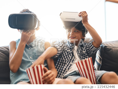 Brother, stealing popcorn and virtual reality headset in home or cyber experience, metaverse system or gaming connection. Children, VR and movie in living room for future, innovation or ui technology 115432446