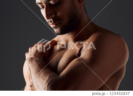Fitness, shoulder or man in studio with thinking, close up or muscles on black background. Active person, bodybuilder or topless for workout with flex, athlete and healthy body or pride with progress Fitness, shoulder or man in studio with thinking, close up or muscles on black background. Active person, bodybuilder or topless for workout with flex, athlete and healthy body or pride with progress 115432837